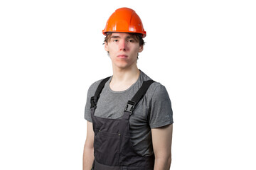 A young man wearing an orange construction helmet. Isolate.