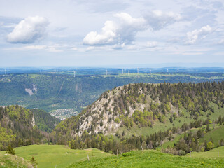 Chasseral, Switzerland - May 26th 2024: Wind engines embedded in the landscape of Mont Crosin