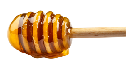 A honeycomb stick with honey dripping from it. The stick is wooden, and the honey is golden