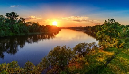 Obraz premium sunset over a serene river nature landscape peaceful environment vibrant wilderness view