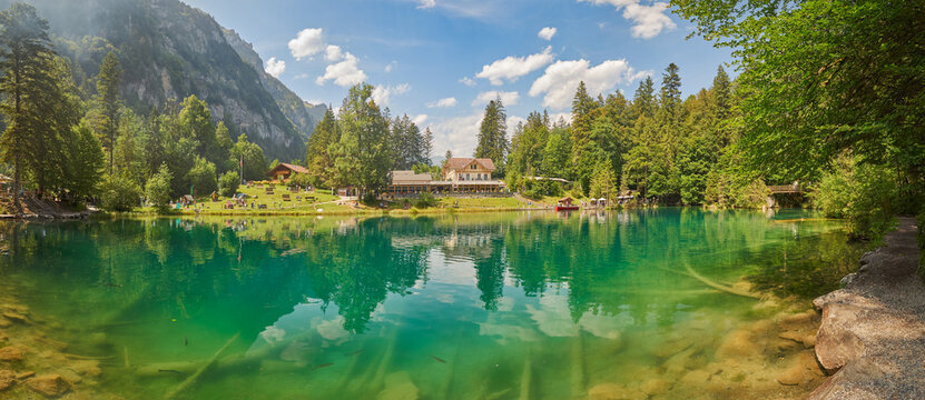 View of the crystal-clear waters of Lake Blausee, Switzerland.