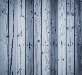 Naklejka premium A modern and rustic wood paneling background, featuring grey-blue stained or weathered vertical boards 