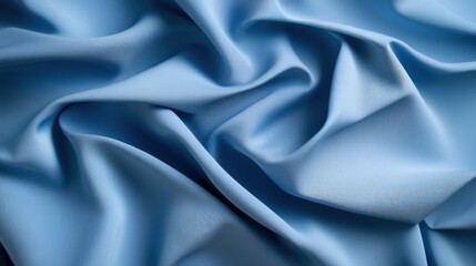 Obraz premium Pale blue fabric with smooth folds texture for background design