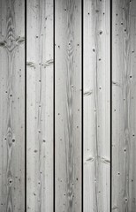Fototapeta premium A rustic or Scandinavian style wooden wall background, featuring weathered grey planks with a beautiful, visible grain 