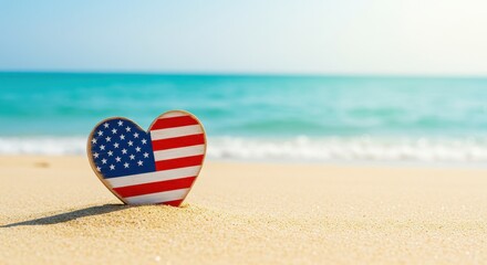 Patriotic Heart with USA Flag Design Rests on a Sunlit, Golden Sandy Beach