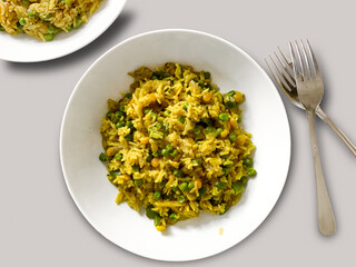 Spicy matar pulao (pease pulao) with green beans vegetarian dinner lunch served in bowl. Top view.