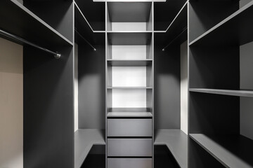 Wardrobe with shelves in the dressing room