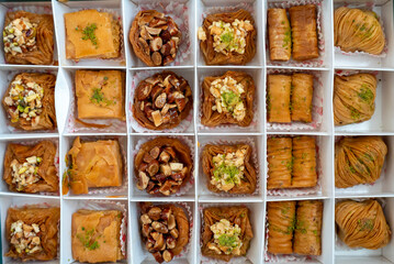 Baklava pastry dessert food sweet box treat honey nut pistachio turkish cuisine arabic pattern delicious traditional snack collection variety flatlay