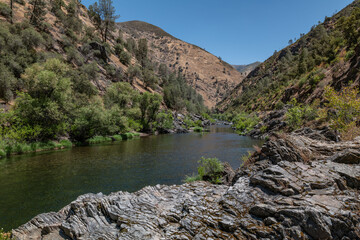 Fototapeta premium Phyllite and chert of Hite Cove (Triassic). California State Route 140, Midpines, Mariposa County. Metamorphic rock. Sierra Nevada. Merced River.
