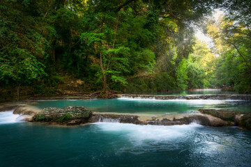Elsa River and little waterfalls along the Sentierelsa trail. Colle di Val d'Elsa, Tuscany, Italy