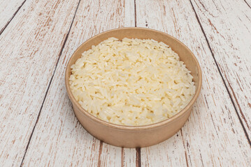 White rice fresh from the pot: fluffy texture and tempting aroma that evokes memories of home