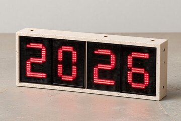 the number 2026 in red on a digital display