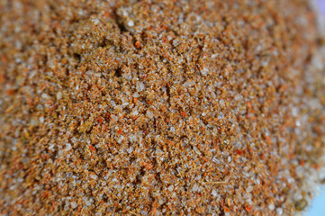 Closeup of Potato seasoning spices, a combination of spices that will add delicious flavor to all sorts of potato dishes, usually made of mixture of sea salt, garlic granules, Paprika and pepper