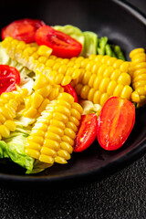 Corn salad tomato fresh vegetables snack fresh delicious gourmet food background on the table  rustic food top view copy space keto and paleo diet vegetarian and vegan food