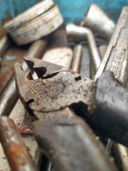 Close-up of Rusty Pliers in Toolbox