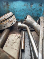 Close-up of Metal Tools in a Blue Toolbox