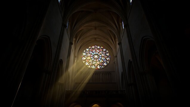 Gothic rose window illuminated by soft light