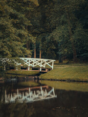 old wooden bridge over the river in the Karlsaue State Park in Kassel