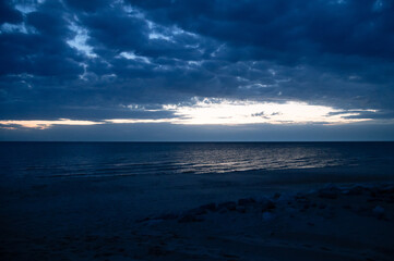 Fototapeta premium A Lake Michigan beach after sunset on a cloudy evening 