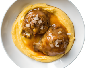 braised rabbit with polenta, main course in a white dish, on transparent background, delicious food italian recipe