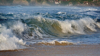 Waves breaking on the beach in Zipolite, Mexico