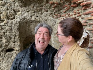 Candid Outdoor Portrait of a Happy Couple on Holiday