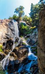 Fototapeta premium Grizzly Falls Cascading Down Rock Wall in Kings Canyon, Sequoia National Forest, California, USA