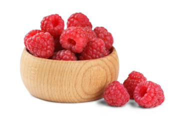 Close up, macro of fresh red ripe raspberries in rustic wooden bowl isolated on white, transparent background. Natural, organic fruit still life for healthy lifestyle and clean food, eating themes.