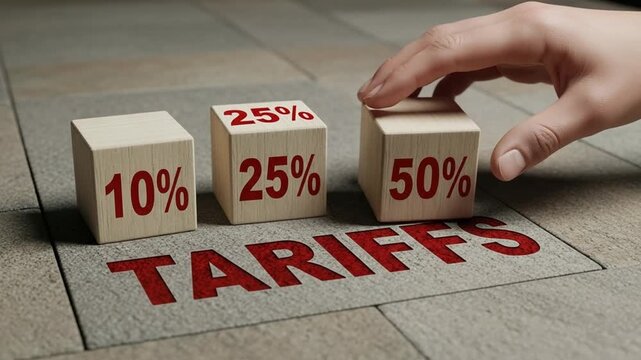 Hand moving wooden block with percentage sign near tariffs text on stone surface concept image