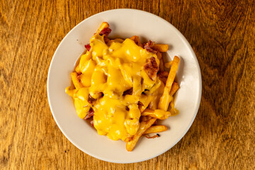 French fries with cheese and bacon