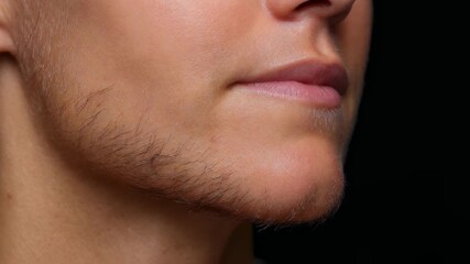 Side view of womans jawline with visibly dark hairs sprouting swiftly demonstrating cosmetic challenges of hirsutism.
