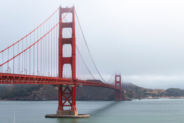 Golden Gate Bridge Spanning San Francisco Bay On Foggy Day