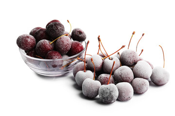 Many ripe frozen cherries isolated on white
