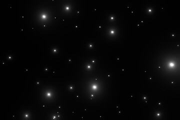 黒背景に輝く白い粒子