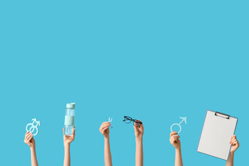 Female hands with symbols of man, blue ribbon and clipboard on color background. Prostate Cancer...