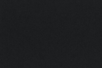 Textured black paper with rough wrinkled lines. Fibrous black paper background.