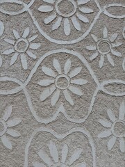ancient stone wall flower design 