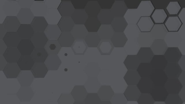 A seamless loop animation of a grey abstract background with a repeating pattern of hexagons