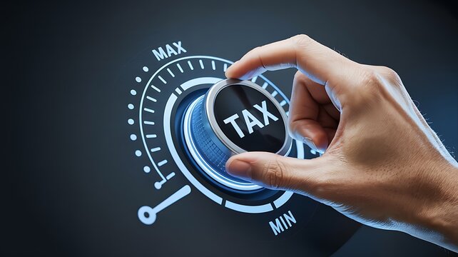Close up of a person s hand turning a dial labeled tax to the maximum setting on a futuristic digital interface