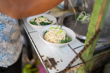 Indonesian Chicken Noodles Sold from Grobak Cart