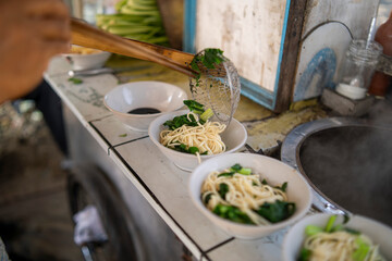 Indonesian Chicken Noodles Sold from Grobak Cart