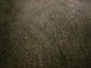 Carpet background with abstract brown pattern.