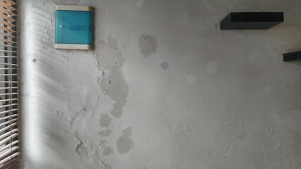 Wall with Water Damage and Window Blinds Indoors