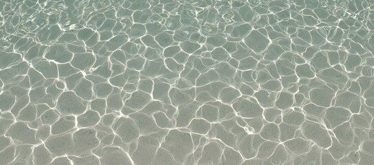 Light reflecting on rippled, shallow water