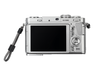 Rear view of a modern silver digital compact camera with a black screen and wrist strap isolated on transparent background