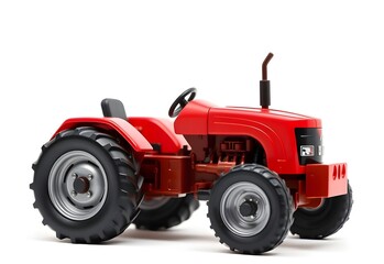 A classic red vintage toy tractor, an agricultural machine for farming, isolated on a white background