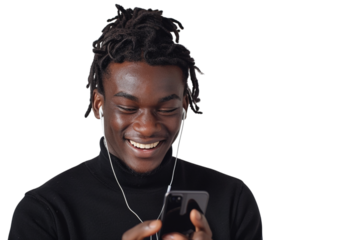 Upbeat man with dreads listens to music on his phone against a white background. Ideal for social media, advertising, or websites.