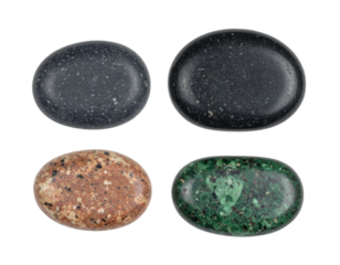 Four polished oval stones showcase unique natural textures and colors, perfect for design projects