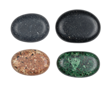 Four polished oval stones showcase unique natural textures and colors, perfect for design projects