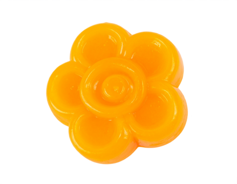 Vibrant orange candy shaped like a flower offering a sweet, cheerful treat for any occasion
